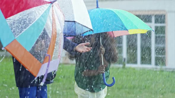 Children Playing in Rain