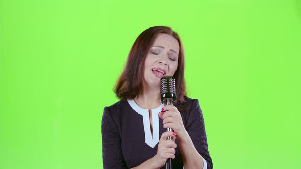 Lady Performs Her Song of Authorship. Green Screen