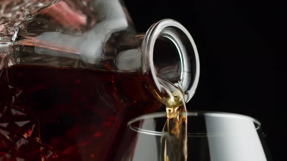 Pouring Brandy or Whiskey Closeup