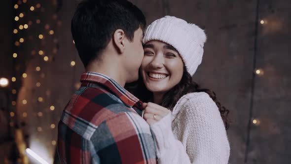 Portrait of Two Happy People in Love Wearing Winter Clothes, Having Fun Together