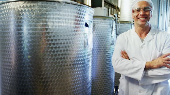 Technician standing with his arms crossed