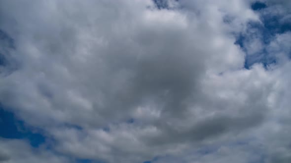 Clouds Move Smoothly in the Blue Sky. Timelapse