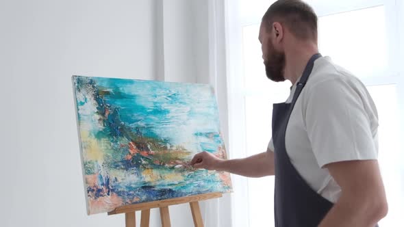 Super Slow Motion 240 Fps the Artist Paints an Abstract Picture in the Studio