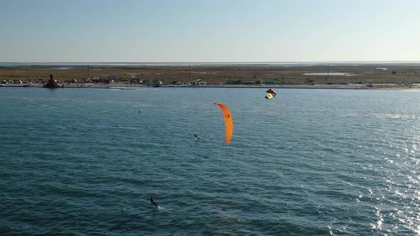 Kite Surfers Are Gliding Sea Summer Water Sports Aerial Shot