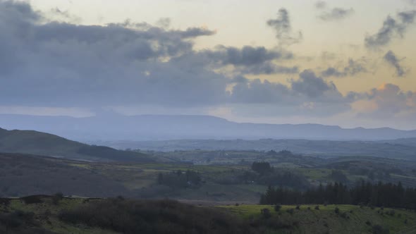 Time lapse of rural agricultural nature landscape during the day in Ireland. alt
