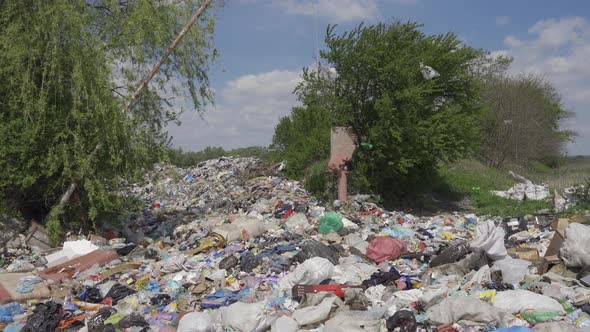 Overcrowded Landfill. Waste-filled Entrance To the Landfill. Lots of Waste.