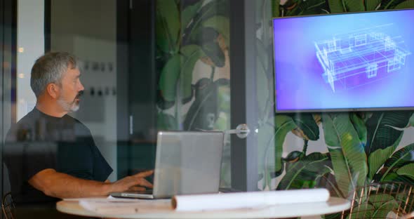 Male Executive Using Laptop in Meeting Room 4k