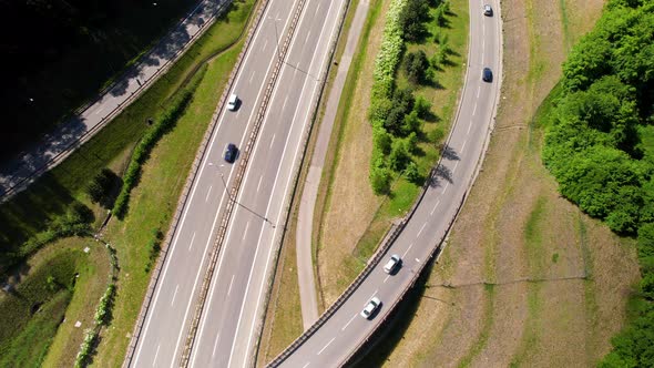 Beautiful Top Down Shot Of Busy Cars Driving Over Overpass On Asphalt Road.