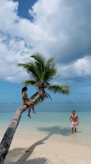 Anse Takamaka Beach Mahe Seychelles Tropical Beach with Palm Trees and a Blue Ocean Couple Man and