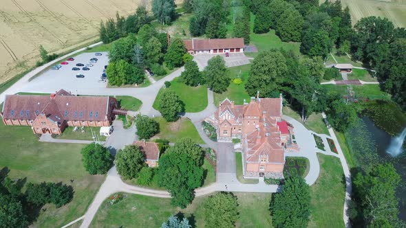 Jaunmoku Brick Medieval Castle Near Tukums, Latvia  Aerial Dron 4k Shot Jaunmokas Manor Park.