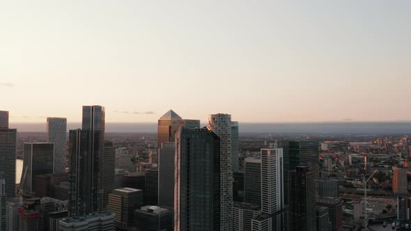 Fly Around Tall Skyscrapers Towering High Above Other Buildings in City