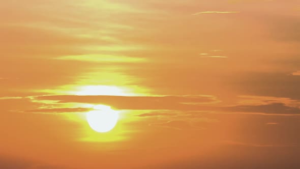 Timelapse of a Beautiful Orange Sunset with  Clouds alt