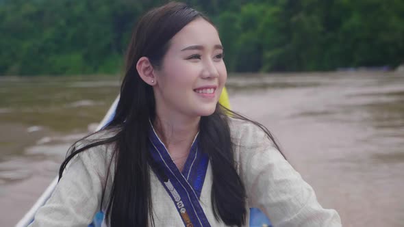 Woman Enjoy On Small Wooden Boat In The Mekong River