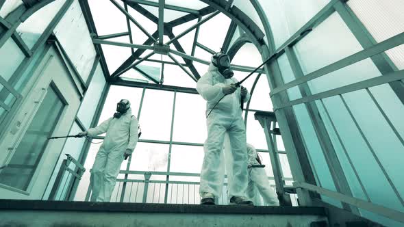 Sanitation Workers Clean Pedestrian Overpass To Kill Coronavirus.