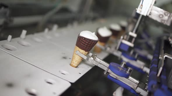Ice Cream Production, Transportation Waffle-cone with Plombir Ice Cream on Production Line, Dairy