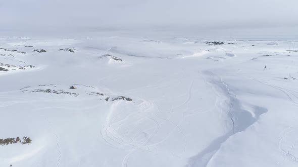 Snowmobile Drive on Snow Arctic Majestic Landscape