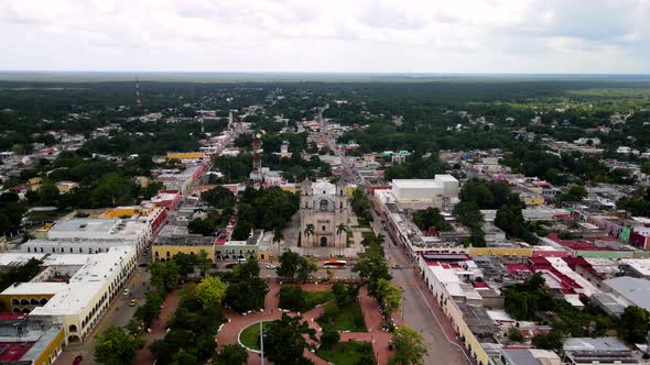 Aerial backwards shot of main town of Valladolid in yucatan Mexico