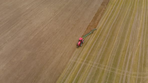 Aerial Tractor Plows Sodpodzolic Soil