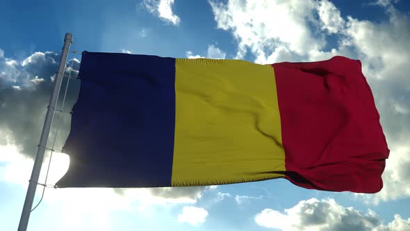 Chad Flag Waving in the Wind Blue Sky Background