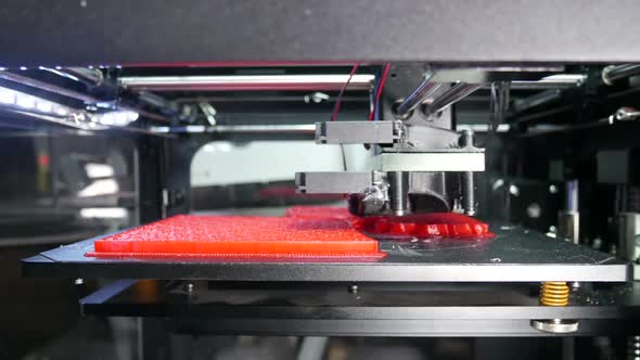 Modern 3 D Printer Prints A Plastic Part