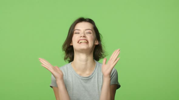 Slowmotion Portrait Cheerful Excited and Lucky Girl Winning Feeling Amused and Thrilled Good News