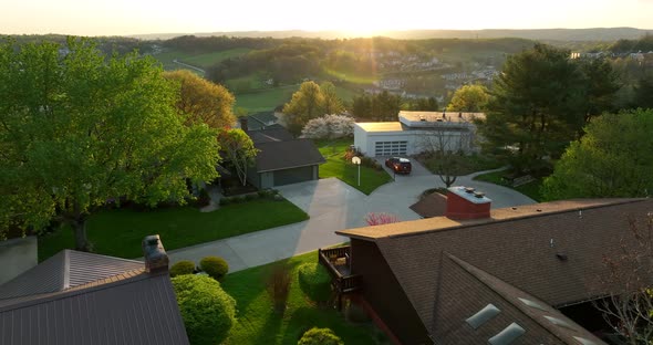 Scenic view from hillside homes in Appalachian Mountains of USA. Colorful spring blossoms at golden