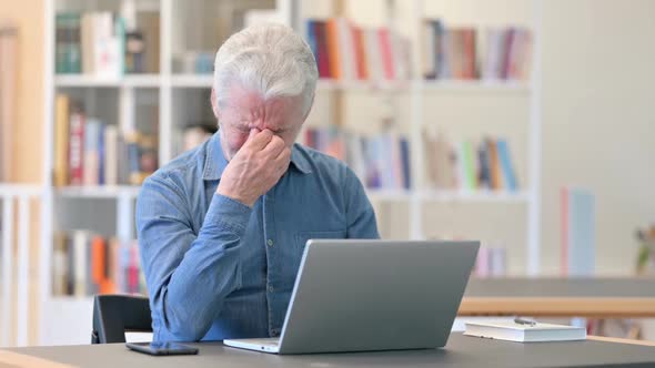 Old Man Having Neck Pain at Work