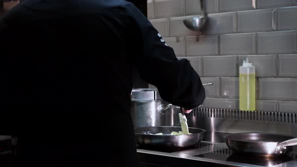 Chef Stirs Creamy Mushroom Paste in a Frying Pan