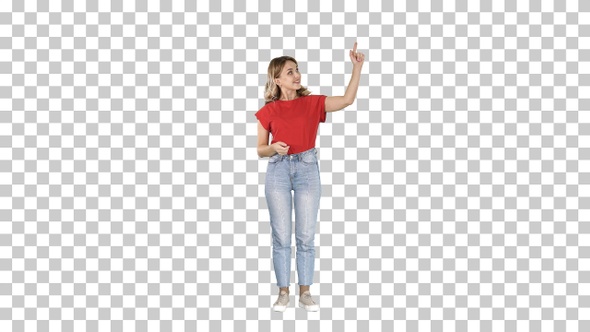 Smiling woman in casual clothes presenting something pushing