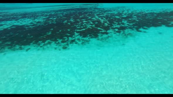 Aerial top down sky of paradise shore beach holiday by blue ocean and white sand background of a day