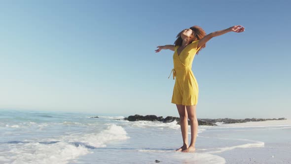 African American woman enjoying the beach