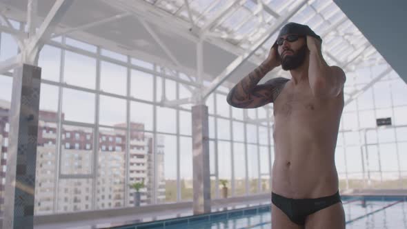 Man Getting Ready for Swimming Practice