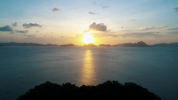 Aerial View From Above on a Tropical Island at Sunset