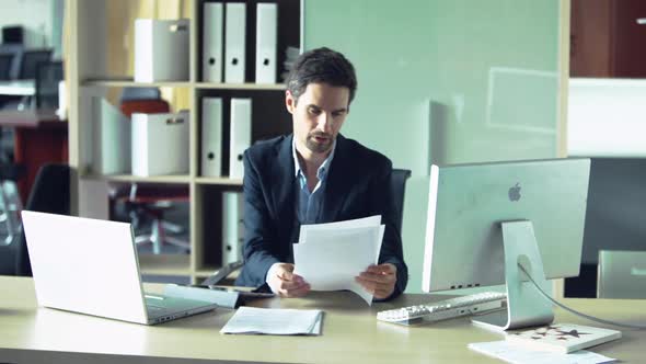 Businessman engrossed in paperwork