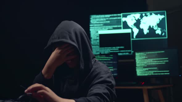 Asian Boy Hacker Using Computer Hacking And Disappointed