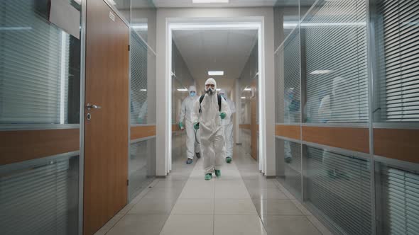 Specialists Disinfecting Empty Office During Quarantine of Coronavirus