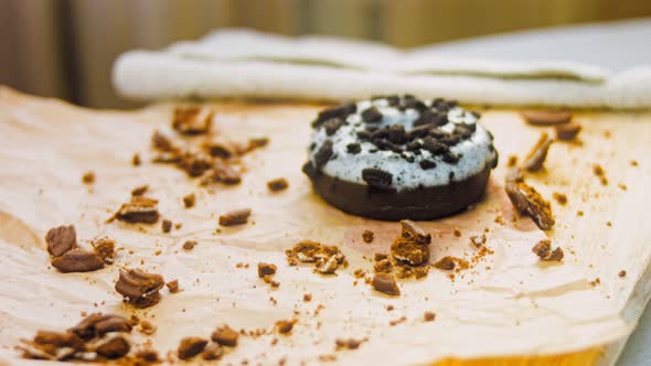 Chocolate Donuts Decorated with Pieces of Oreo Biscuits