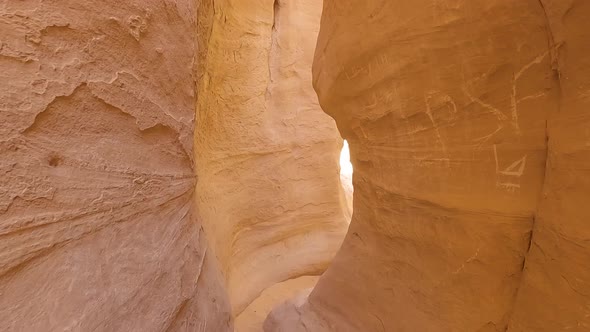 Shot of a narrow gorge in Egypt along the colored canyon with mountains on both side at daytime.