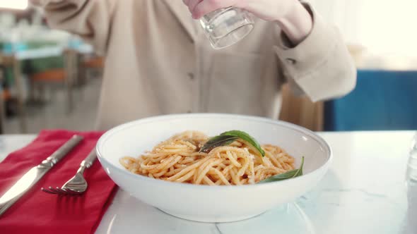 Woman Eating Pasta With Sauce Bolognese