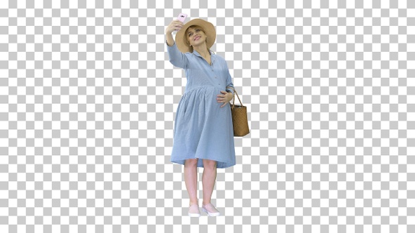 Happy pregnant woman in a hat using her, Alpha Channel