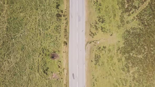 Overhead view of road and parking area in Dartmoor National Park, England.