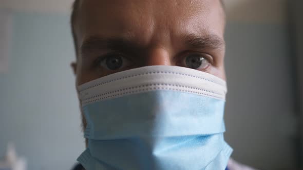 Sight of Male Doctor Wearing Protective Mask From Virus