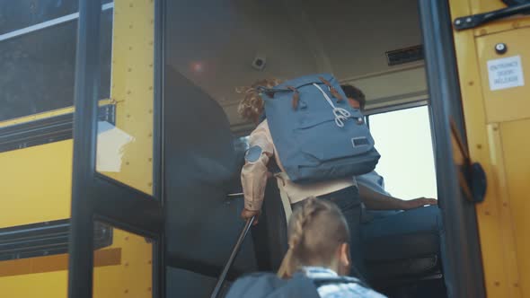 Multi Ethnic Children Boarding School Bus