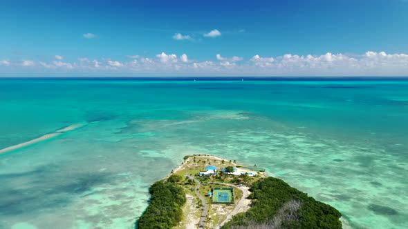 Private Beach Resort With Recreation Area In Tea Table Key Island, Islamorada, Florida. aerial pullb
