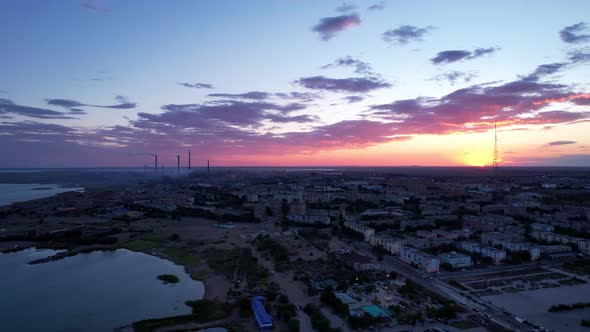 Pink Sunset Over a Small Town