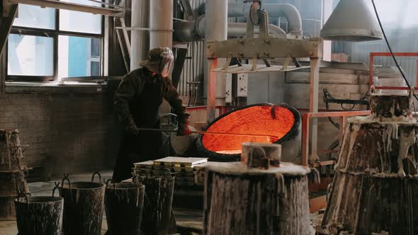 Steelmaker Works in a Foundry