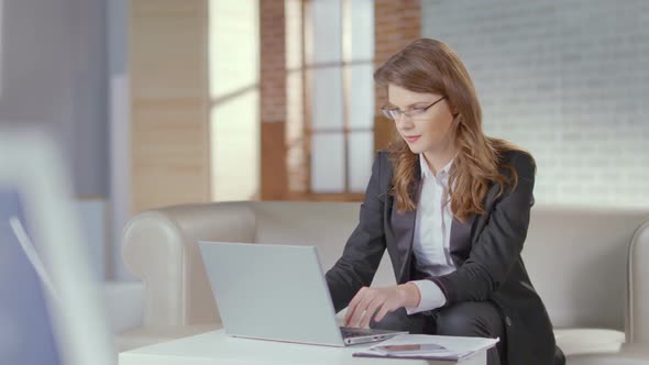 Attractive Woman Business Suit Working in Office, Using Laptop