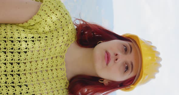 Portrait of a girl engineer looking at the panorama in the mountains