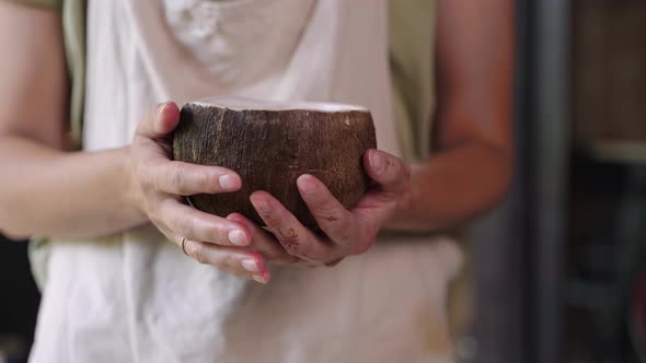 Craft and Handmade Ceramic Pot in Hands of Skilled Artist