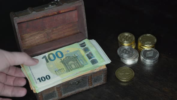 Bitcoin, Euro Banknotes and Golden Btc Coins on the Treasure Trove